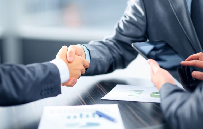 Business Men Shaking Hands - US Trademark Attorney