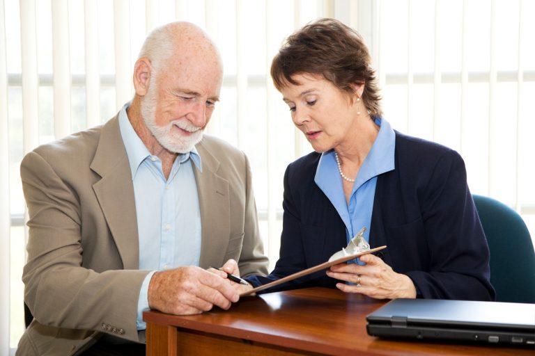 Man Signing Contract - idaho falls personal injury attorney